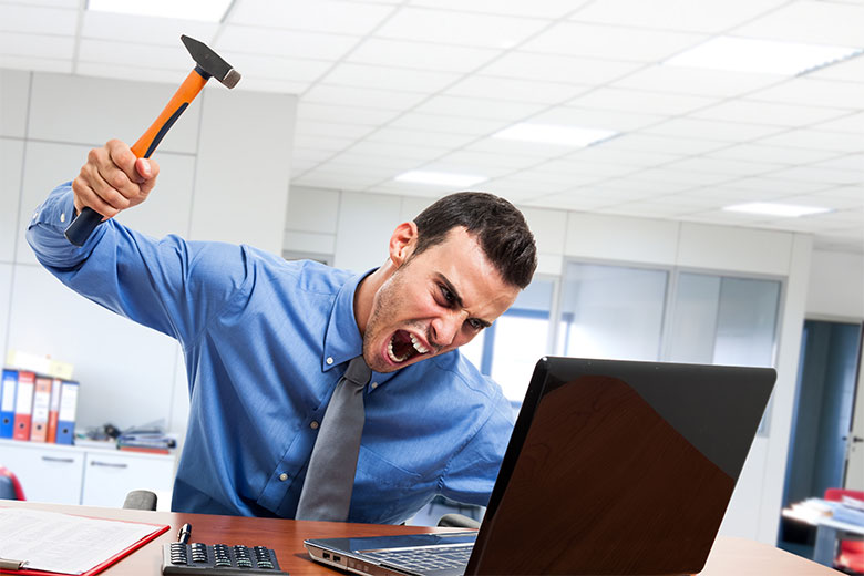 Smashing-Laptop-With-Hammer